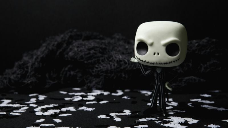 Mysterious skull figure on dark background