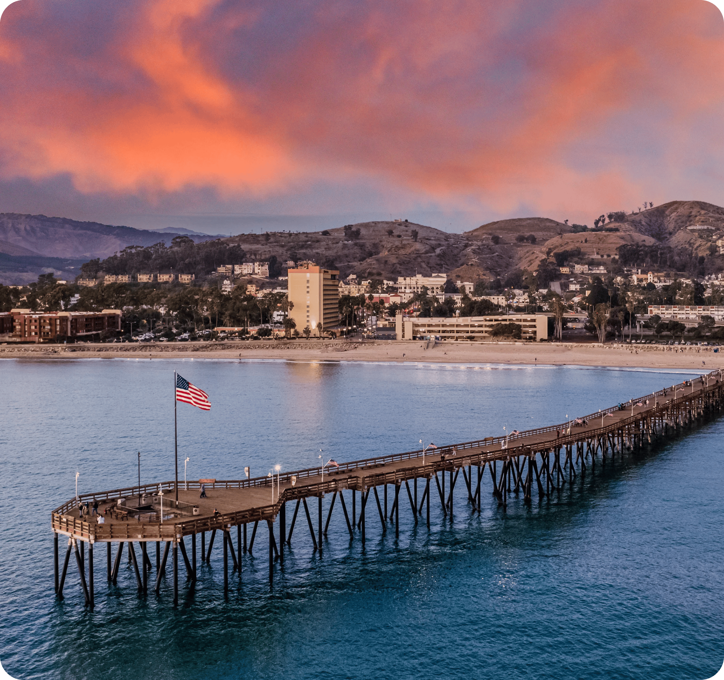 pier-on-a-beach-during-sunset-in-ventura-californ-2023-11-27-05-32-39-utc 1